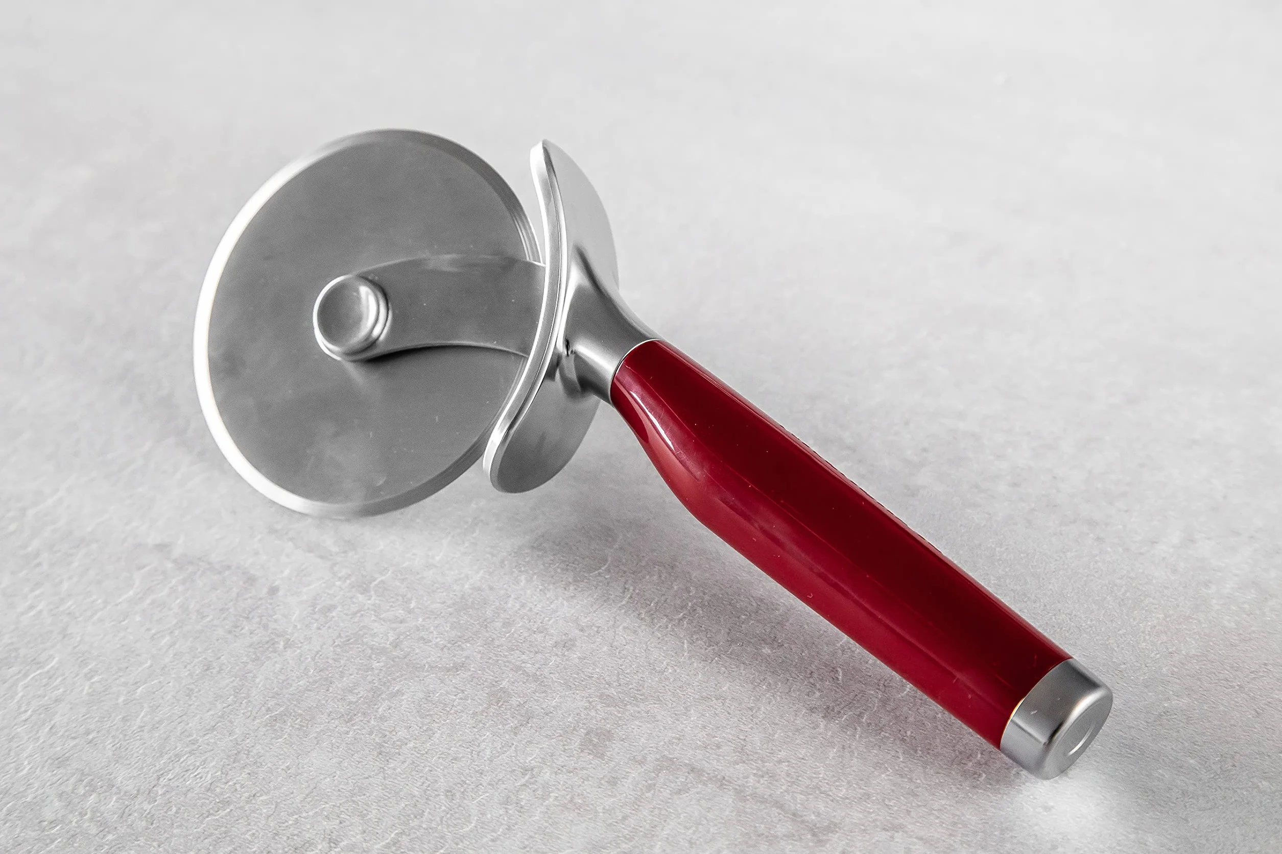 KitchenAid Nóż do Pizzy, Radełko, Stal Nierdzewna - Kolor Empire Red