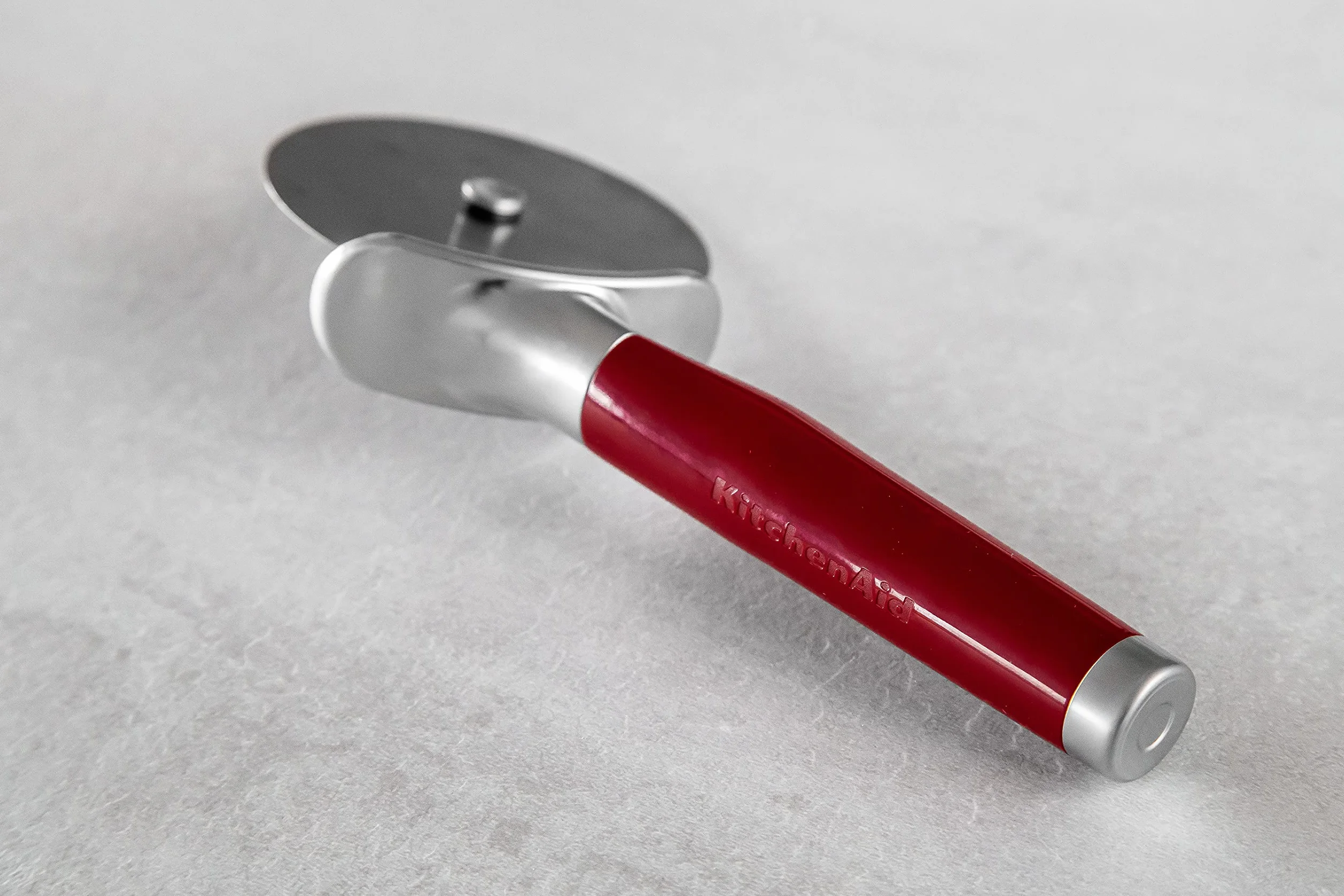 KitchenAid Nóż do Pizzy, Radełko, Stal Nierdzewna - Kolor Empire Red