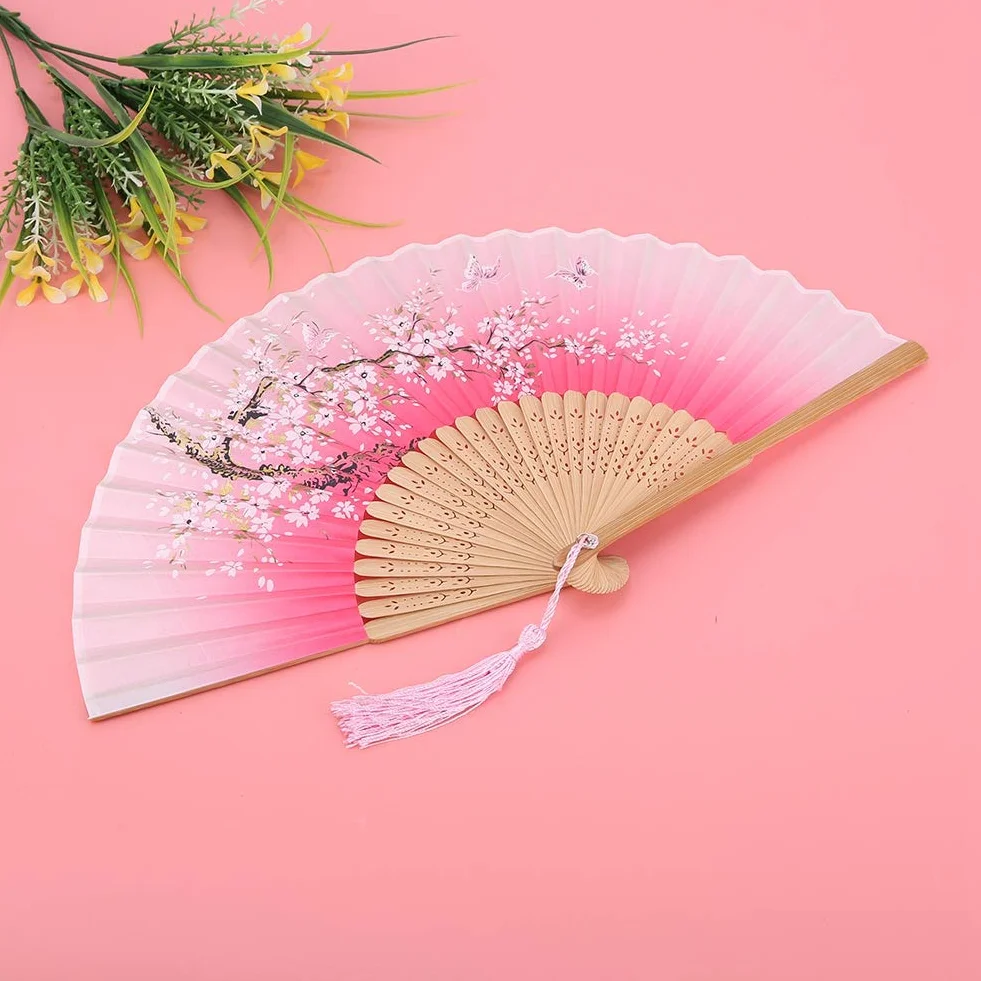 Ręczny składany wentylator, wachlarz z papieru ręcznego dla kobiet Vintage Retro letni wentylator z eleganckim pomponem, bambusowa ramka na taniec weselny Prezenty na przyjęcie kościelne Rekwizyty sceniczne. (Różowy)