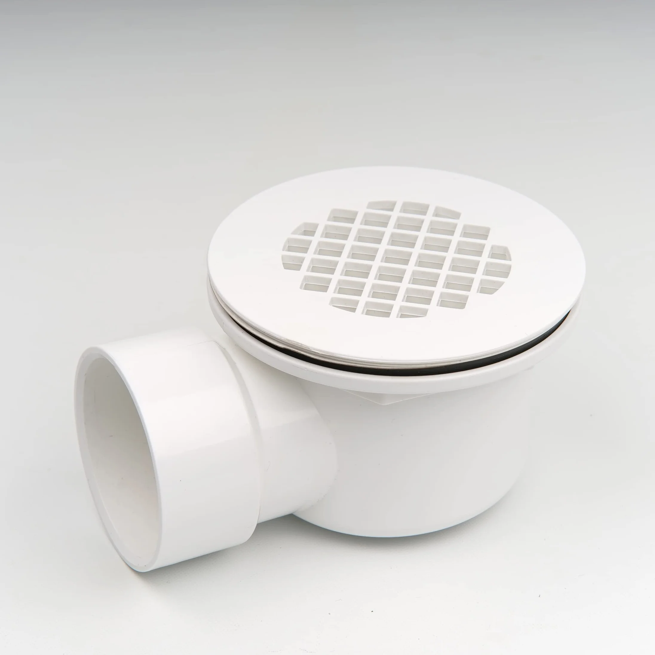 Niskoprofilowy odpływ prysznicowy 5 cm z reduktorem 5 cm x 1-1/5.1 cm i perforowanym sitkiem - zespół odpływu bocznego z PCW do wymiany podstawy prysznicowej i odpływu