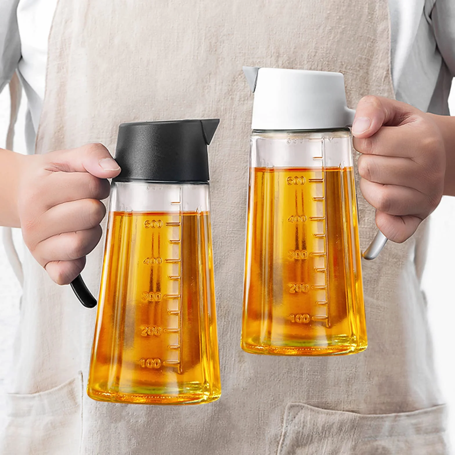 Szklana butelka na olej 650 ml z automatycznym otwieraniem i zamykaniem, antypoślizgowy uchwyt, beżowa