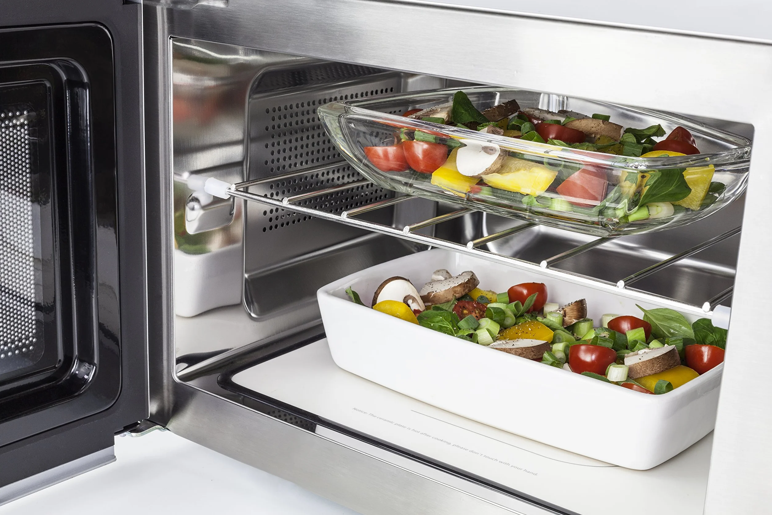 CASO MG20 Ceramic menu kuchenka mikrofalowa 2 w 1 z grillem, ceramiczny spód i ruszt do grillowania na 2 poziomach, 900 W, 1000 W, 20 l, stal nierdzewna, lustrzane