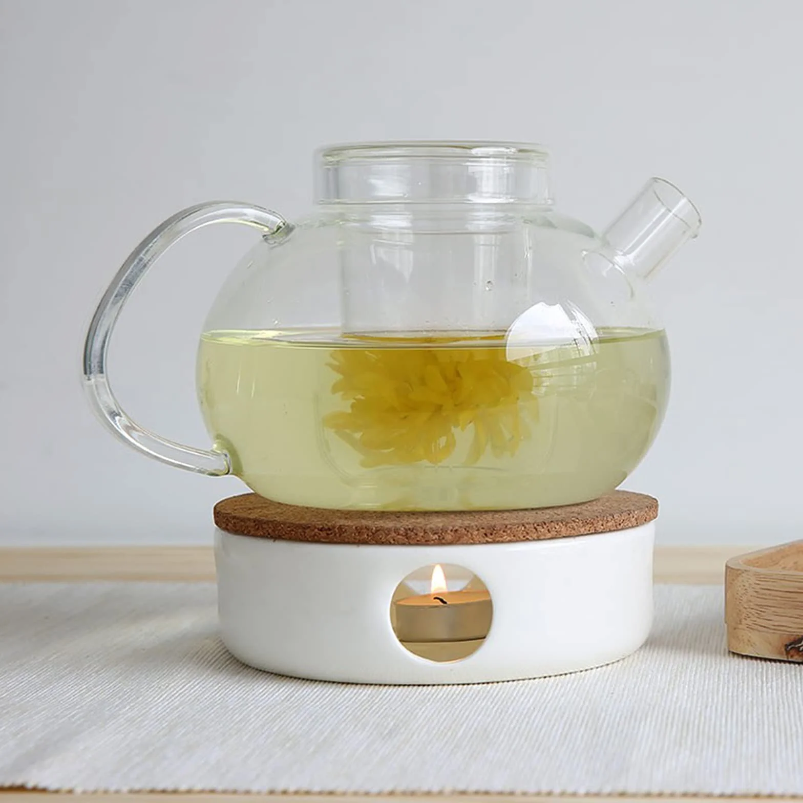 TEA SOUL Bardzo elegancki podgrzewacz do czajniczek z porcelany ze stojakiem z korka. Idealne wsparcie, aby Twój czajniczek był zawsze ciepły, biały