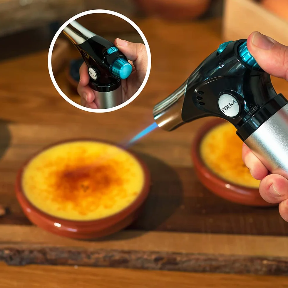 Cecotec Palnik kuchenny Polka Flame-Cook 1000 Steel. Osiąga 1300 ° C, regulator regulacji płomienia, blokada bezpieczeństwa, szczotka, łopatka i przepisy kulinarne włączone