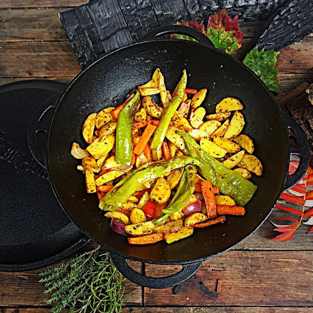 BBQ-Toro Żeliwny kazan z pokrywką | 16 litrów | tradycyjny garnek żeliwny | Kazań z okrągłym dnem | Wok do grilla wstępnie wypalony | garnek do duszenia do gotowania, duszenia, smażenia, smażenia