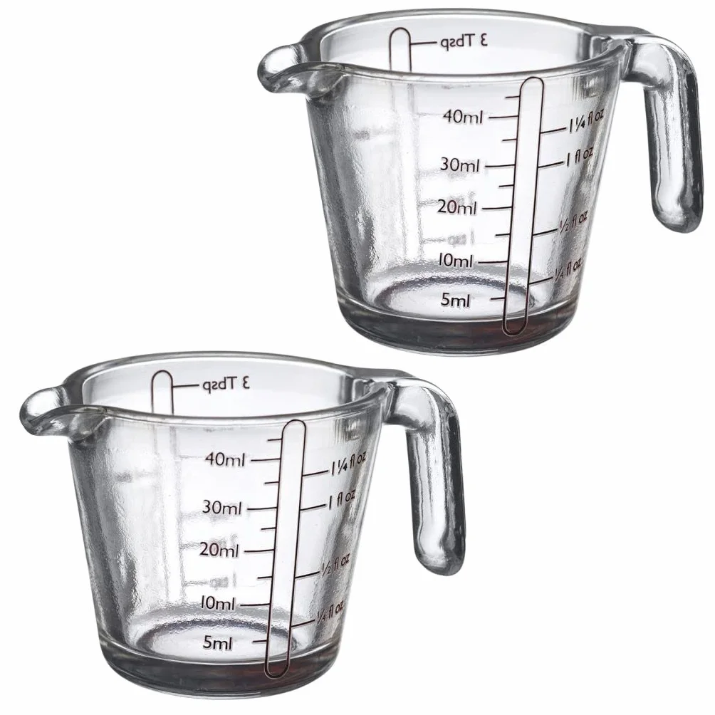 Westmark 305522E3 2 mini szklanki z miarką, 40 ml, 4 różne skale, nadają się do piekarnika, kuchenki mikrofalowej i zamrażarki, kolor przezroczysty/czarny