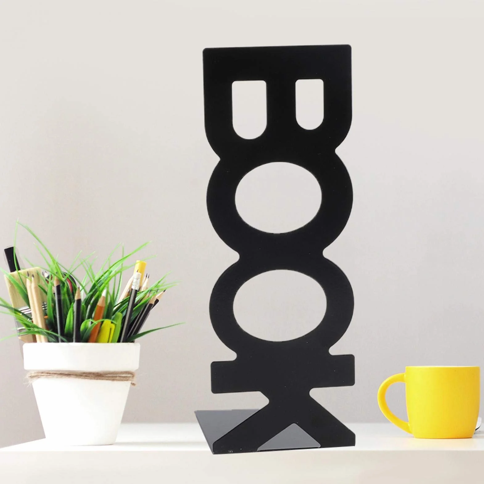 Końcówka książki w kształcie postaci, antypoślizgowa pianka podkładka design Bookend, 208 mm Keep Schludny dla filmów DVD czasopisma (208 mm nowa czarna para)