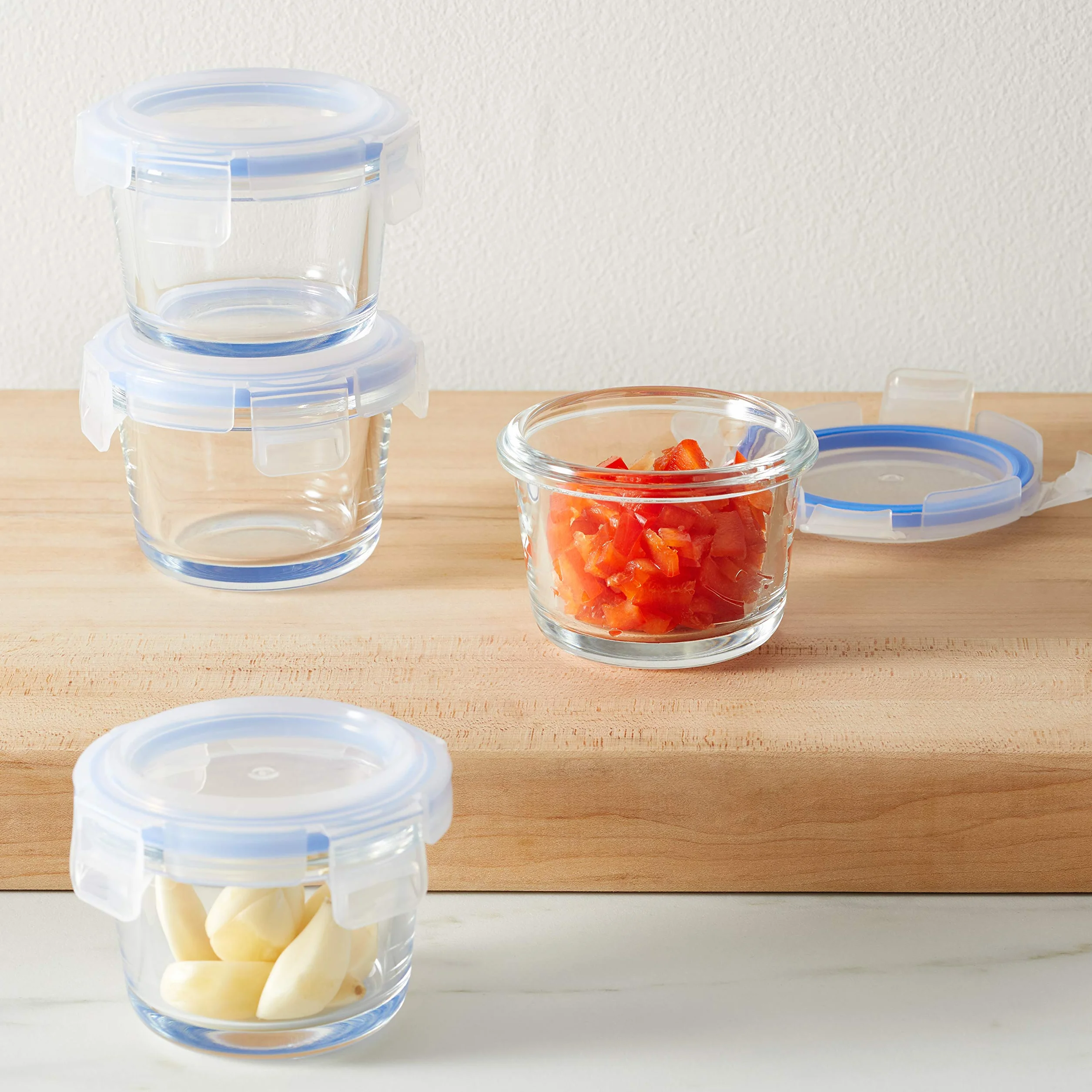 Amazon Basics ABL001 8-częściowy zestaw szklanych pojemników do przechowywania, 144 ml, zestaw 4 pojemników, przezroczystych z niebieskimi pokrywkami