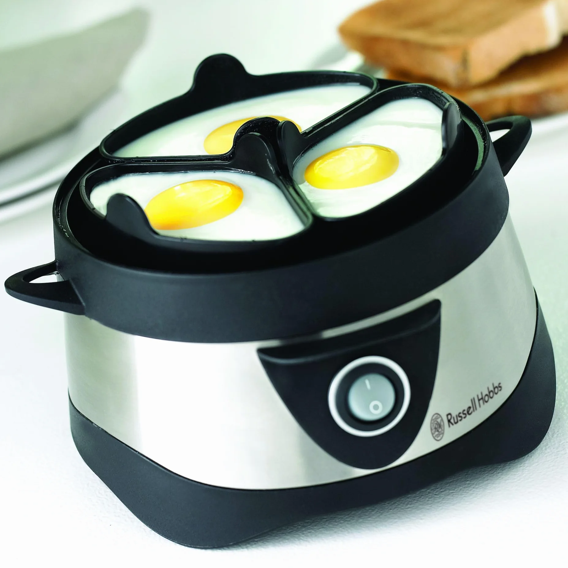 Russell Hobbs jajowar, regulacja twardości jaj, wutomatyczne wyłączenie, wyjmowane elementy, do 7 jaj gotowanych, do 3 jaj sadzonych, stal nierdzewna, plastikowa pokrywka, moc 365W, jajowar 14048-56