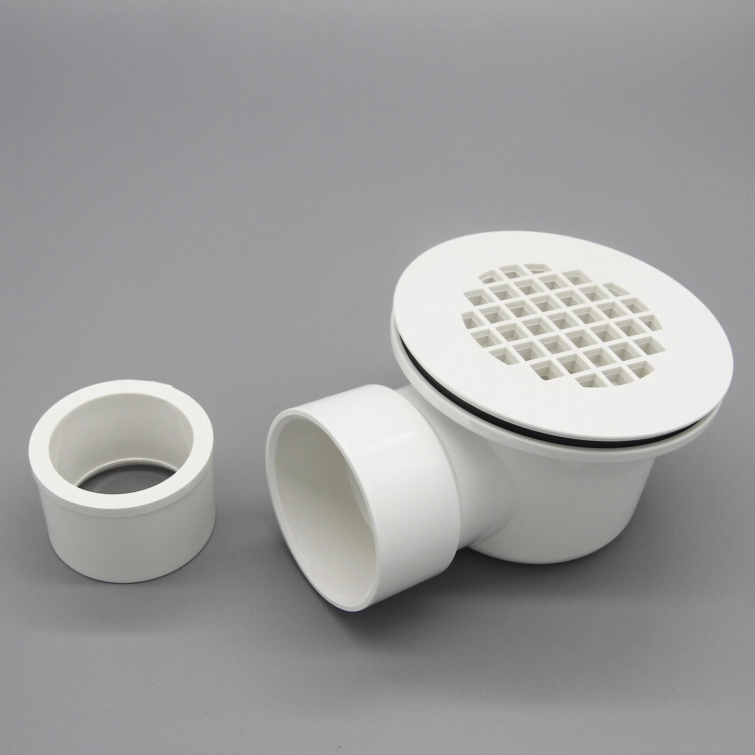 Niskoprofilowy odpływ prysznicowy 5 cm z reduktorem 5 cm x 1-1/5.1 cm i perforowanym sitkiem - zespół odpływu bocznego z PCW do wymiany podstawy prysznicowej i odpływu