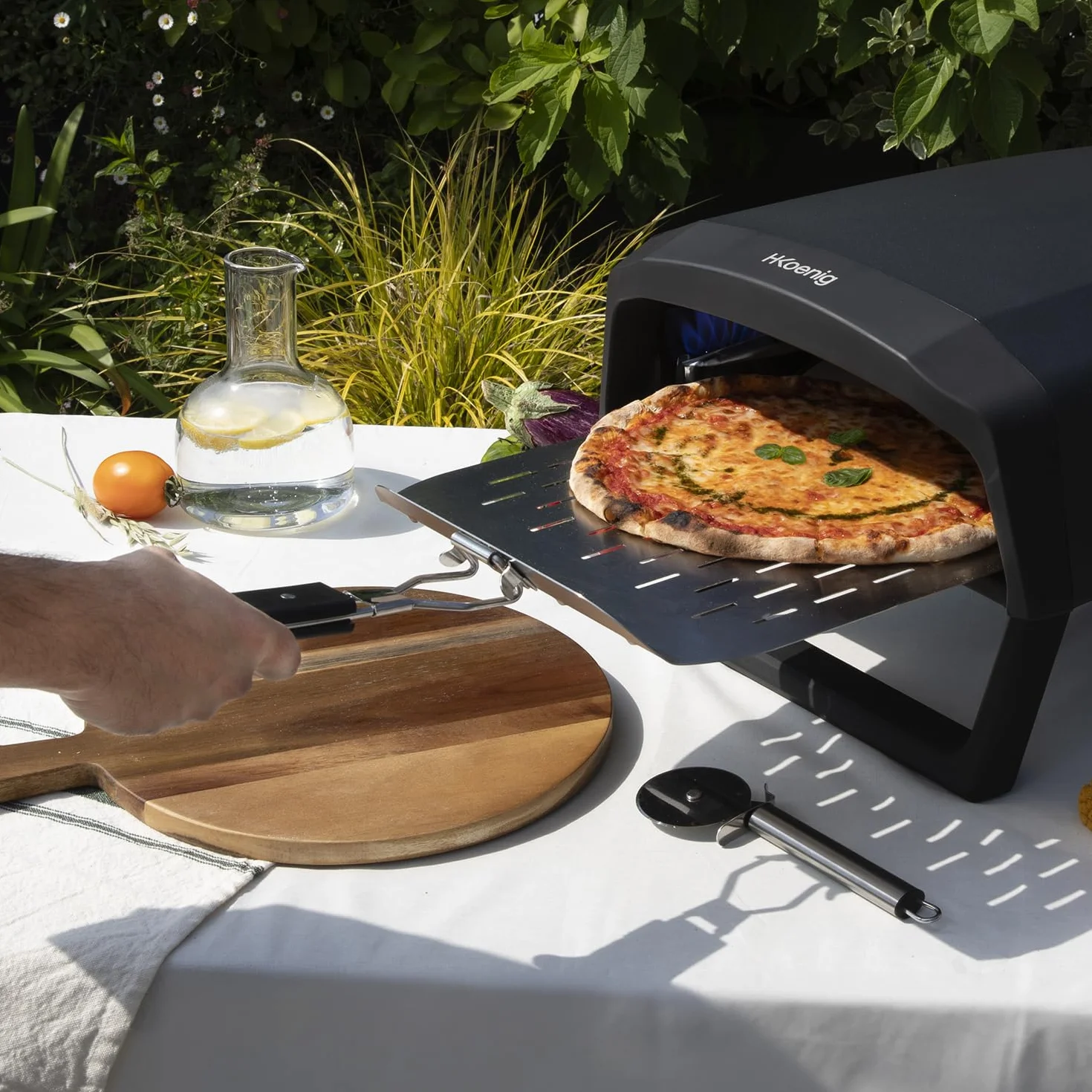 H.Koenig GINO640 piec do pizzy gazowy, stal nierdzewna, 32 cm, powierzchnia obrotowa o 360 stopni, kamień Cordierite, do 500°C, składane nóżki, łopatka do pizzy i regulator