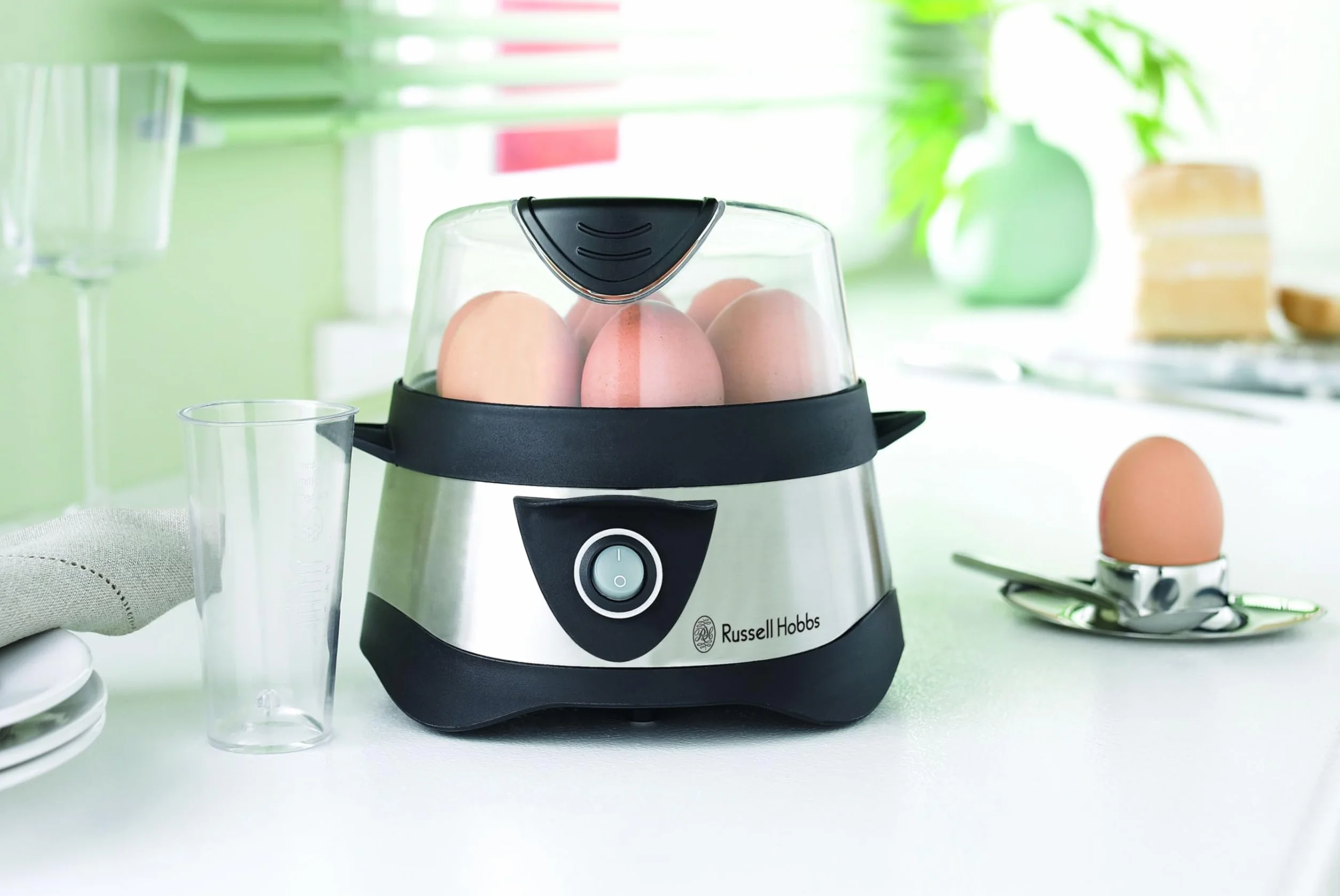 Russell Hobbs jajowar, regulacja twardości jaj, wutomatyczne wyłączenie, wyjmowane elementy, do 7 jaj gotowanych, do 3 jaj sadzonych, stal nierdzewna, plastikowa pokrywka, moc 365W, jajowar 14048-56