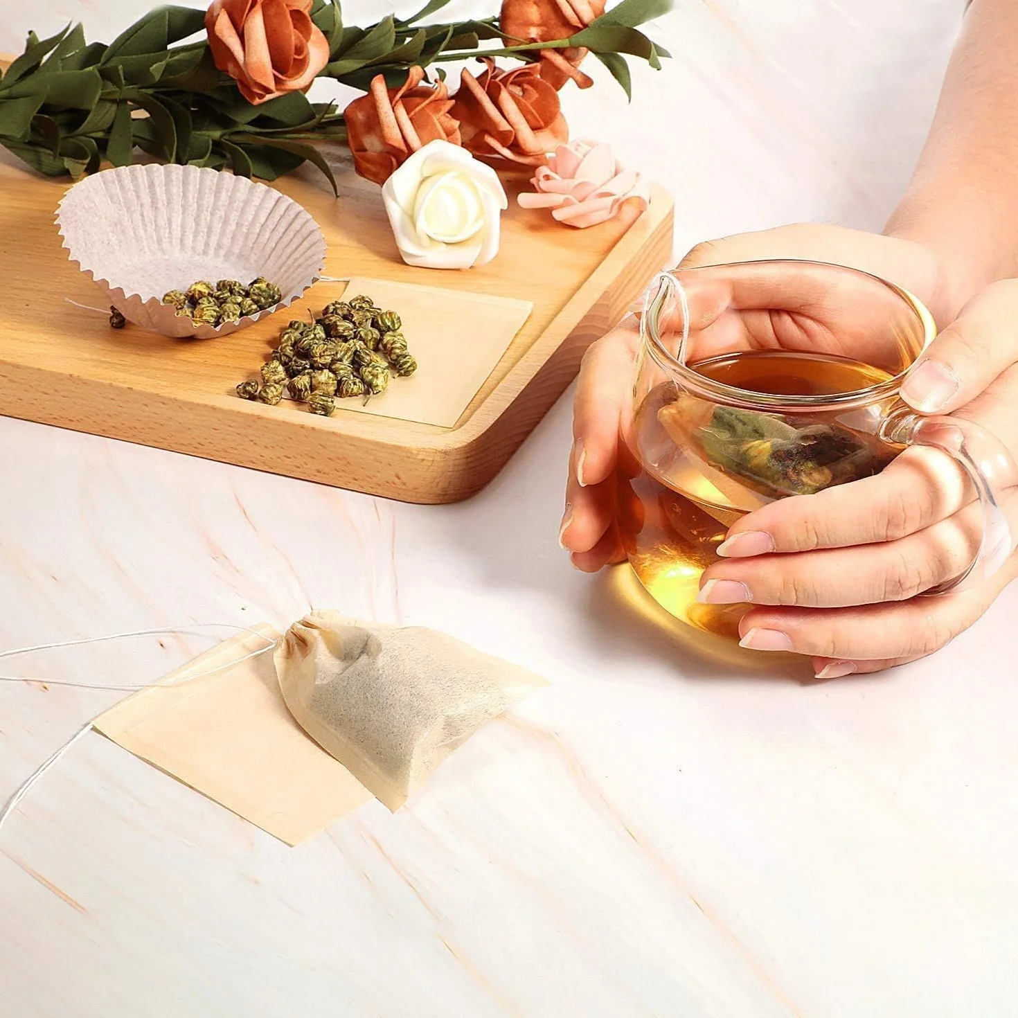 100 szt. jednorazowych torebek do herbaty liściastej, 100% naturalny materiał papierowy z pulpy drzewnej, puste niebielone worki filtrujące ze sznurkiem (9 x 7 cm)